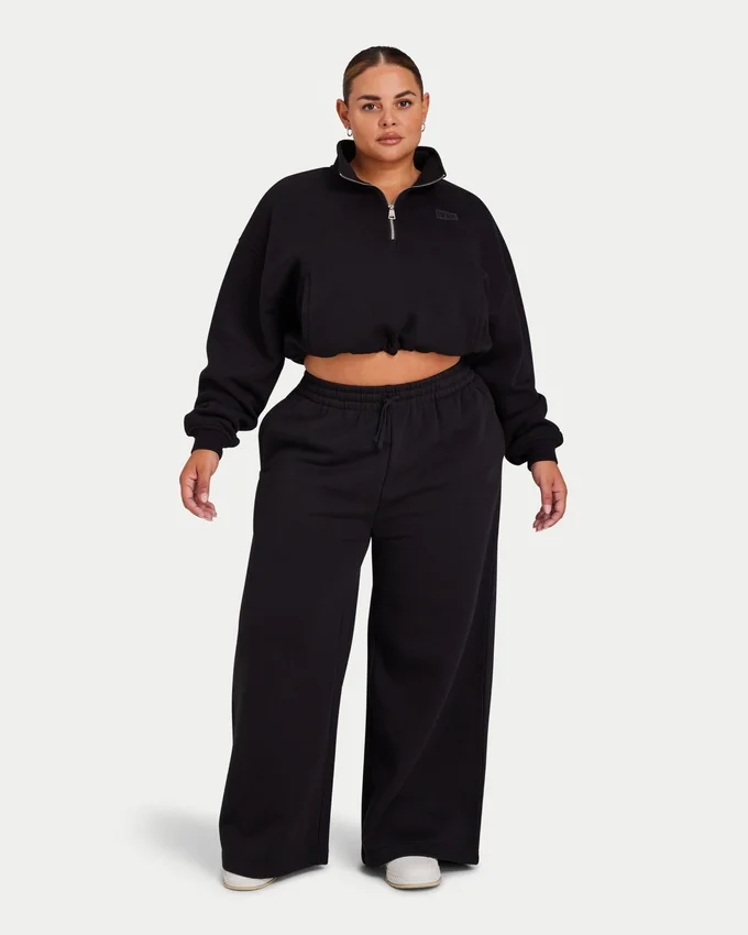 Damen-Jogginghose „Collective“ mit weitem Bein – schwarz Damen-Jogginghose „Collective“ mit weitem Bein – schwarz